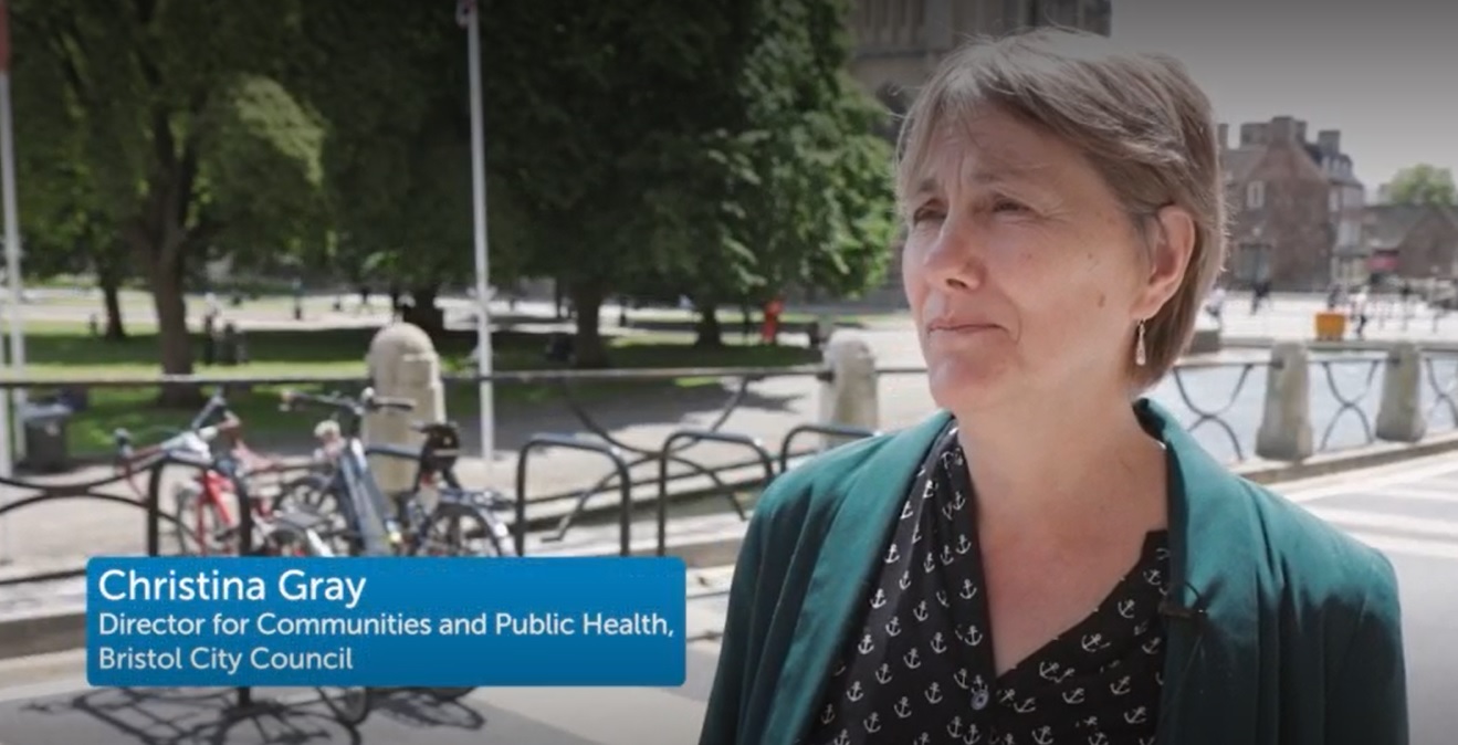 Thumbnail of Christina Gray, Director of Communities and Public Health speaking outside City Hall